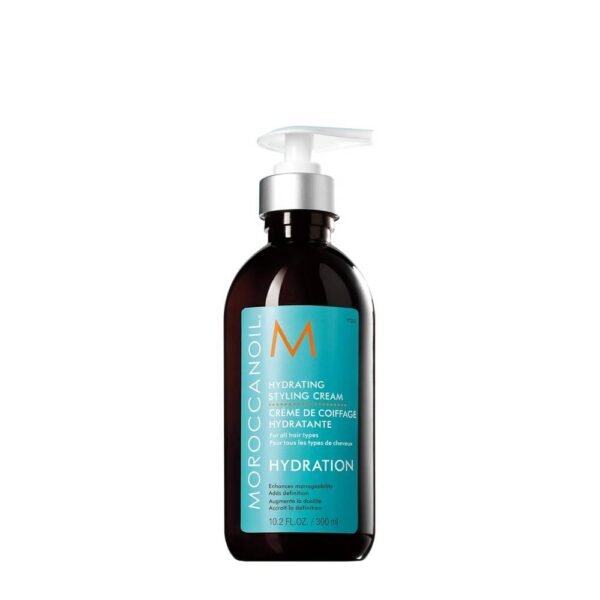 La crema hidratante para peinar marroquíoil controla el encrespamiento y la cabello suelto, nutre y prepara el cabello para peinarlo.