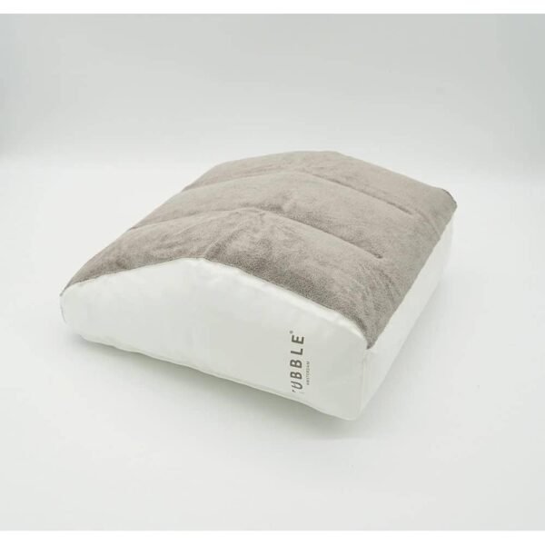 Le Tubble What-A-Pillow Taupe est imperméable, offre un soutien dorsal spécialement conçu et améliore la posture.